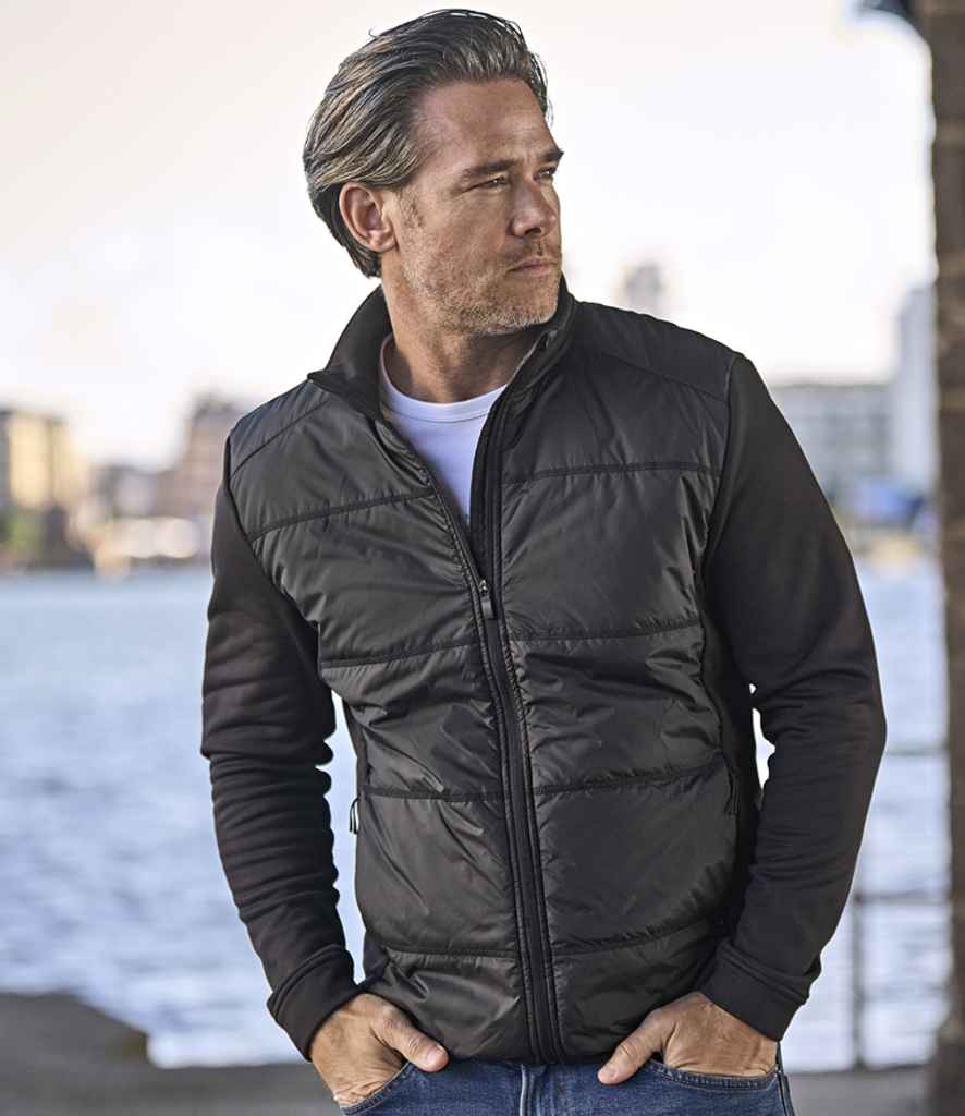 Tee Jays Hybrid-Stretch Jacket | Black/Black - Lancashire Teamwear