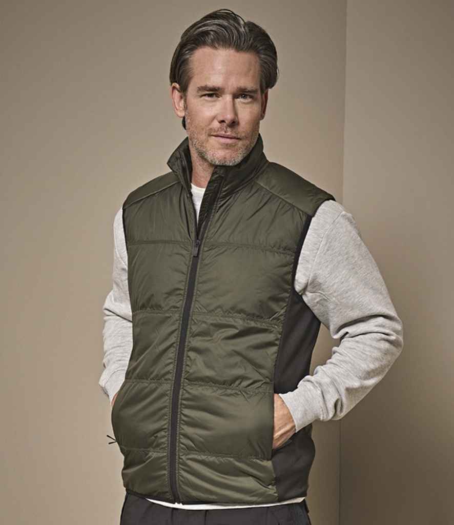 Tee Jays Hybrid-Stretch Bodywarmer | Deep Green/Black Gilet - Lancashire Teamwear